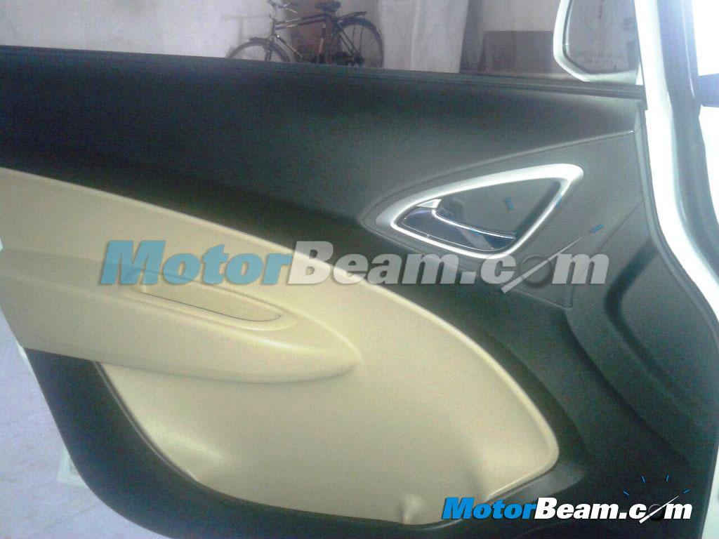 2014 Chevrolet Sail Interior Update Spied Door Trim