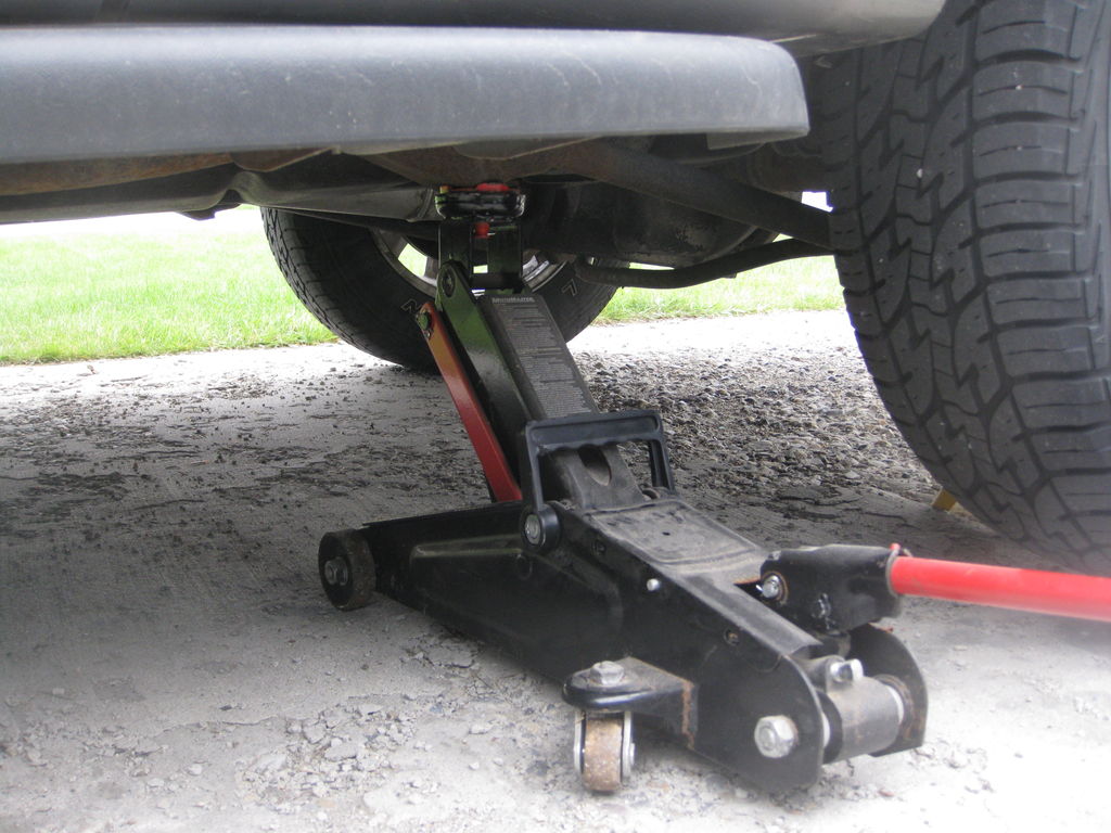 How To Flat Tyre Car On Jack