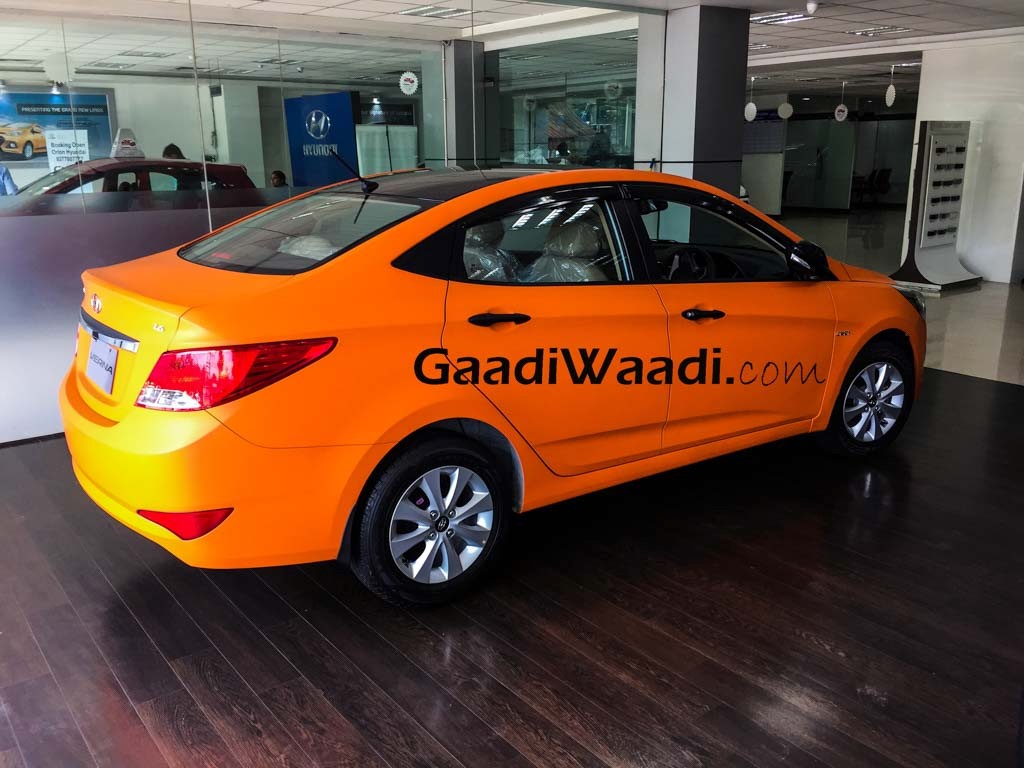 Hyundai Verna Orange Wrap Showroom