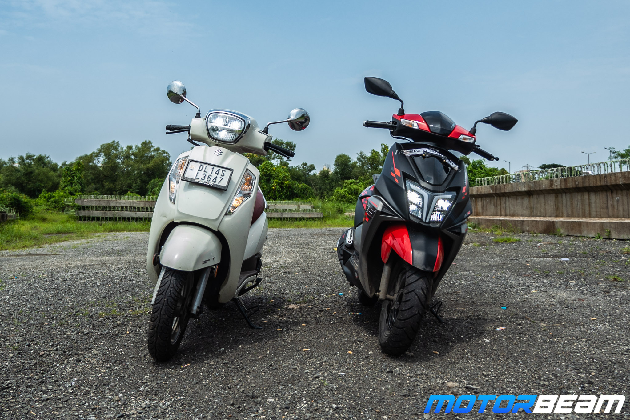 TVS NTorq 125 vs Suzuki Access 125 Comparison Review 1