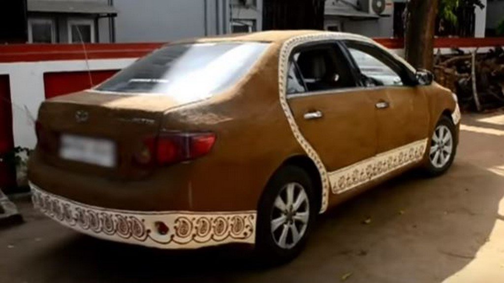 Toyota Corolla In Cow Dung Rear